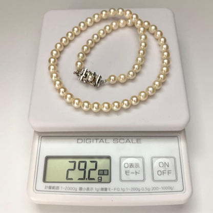 Akoya pearl necklace with 6.5-7.0mm round pearls in champagne gold color, 43cm length