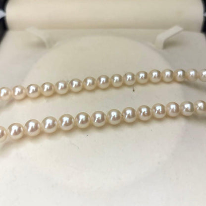 Akoya pearl necklace with 6.5-7.0mm round pearls in champagne gold color, 43cm length