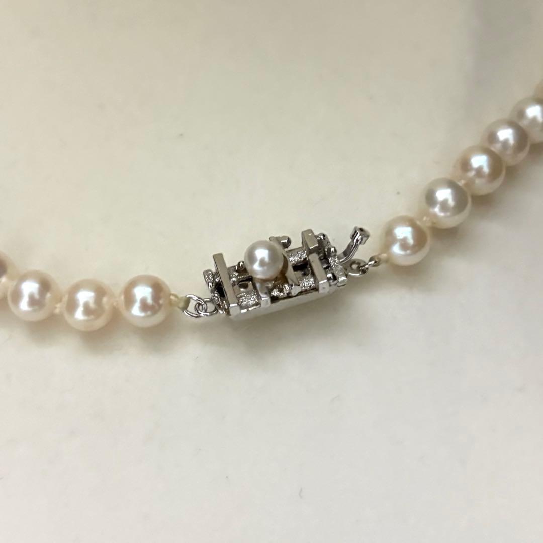 Akoya pearl necklace with 6.5-7.0mm round pearls in champagne gold color, 43cm length