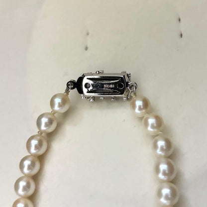 Akoya pearl necklace with 6.5-7.0mm round pearls in champagne gold color, 43cm length