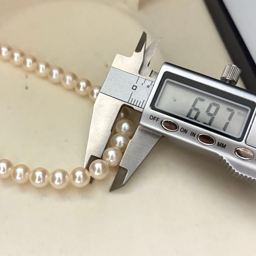 Akoya pearl necklace with 6.5-7.0mm round pearls in champagne gold color, 43cm length