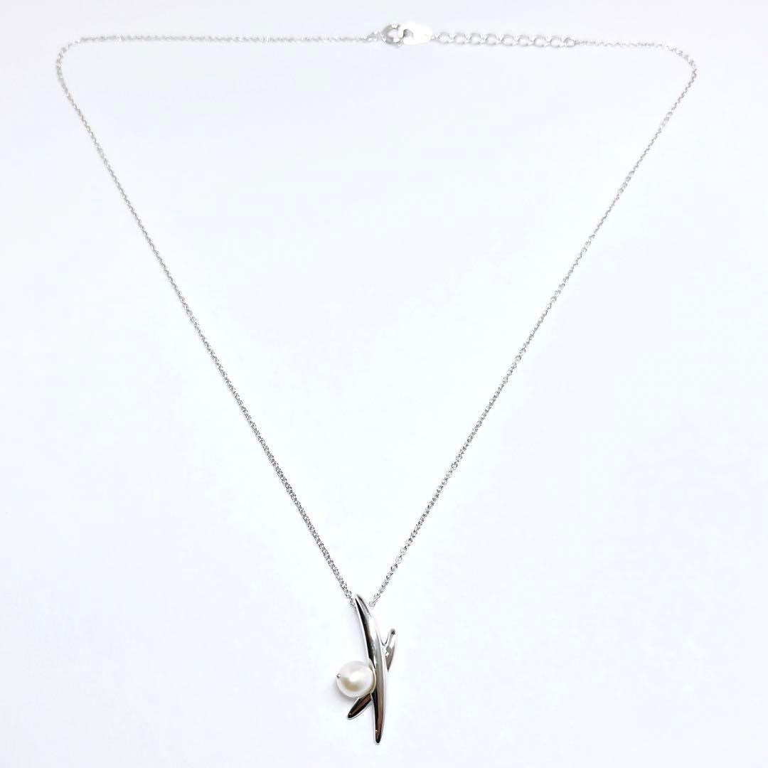 Tasaki pearl necklace with 5.6mm pearls on a 42cm silver chain weighing 3 grams