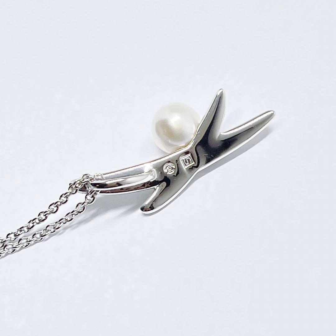 Tasaki pearl necklace with 5.6mm pearls on a 42cm silver chain weighing 3 grams