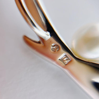 Tasaki pearl necklace with 5.6mm pearls on a 42cm silver chain weighing 3 grams