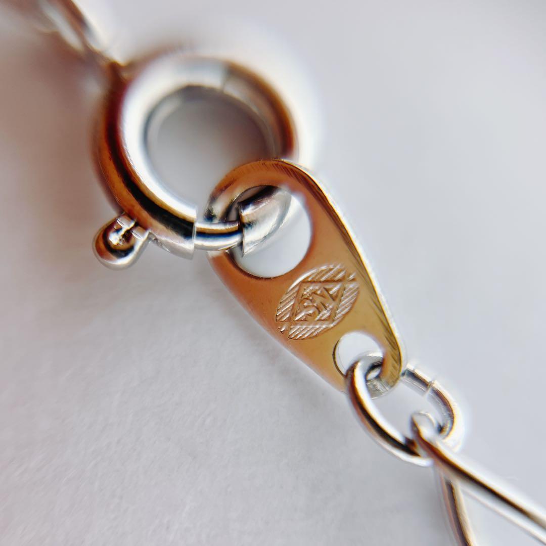 Tasaki pearl necklace with 5.6mm pearls on a 42cm silver chain weighing 3 grams