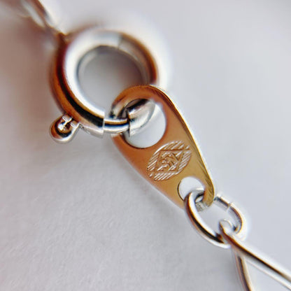 Tasaki pearl necklace with 5.6mm pearls on a 42cm silver chain weighing 3 grams