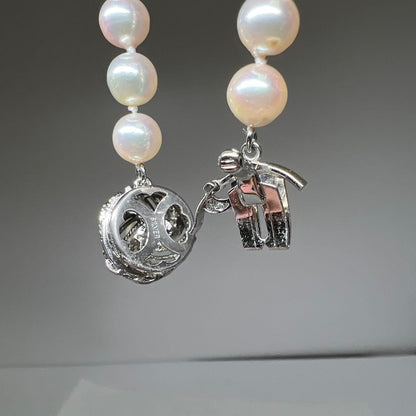 Akoya Pearl Aurora Color Necklace featuring 7.55mm pearls weighing 47g with included case