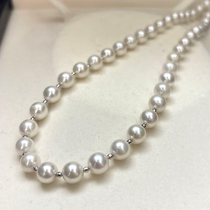 Akoya pearl necklace with white 7.5mm pearls and cliker closure on 57 cm chain