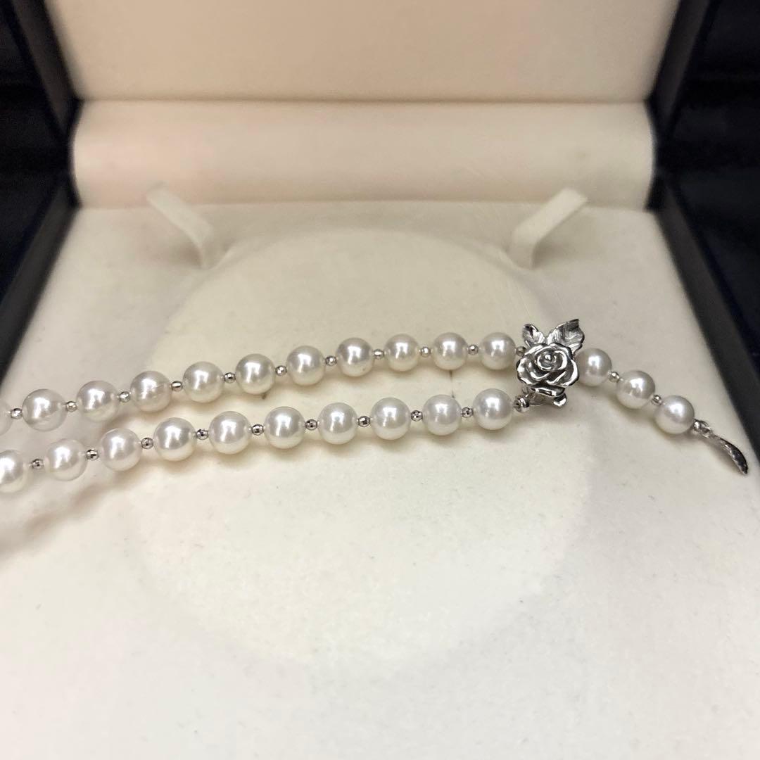 Akoya pearl necklace with white 7.5mm pearls and cliker closure on 57 cm chain