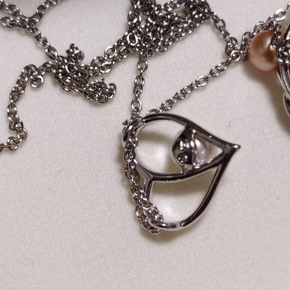 Takasaki pearl necklace pendant set featuring two items without accessories