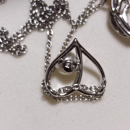 Takasaki pearl necklace pendant set featuring two items without accessories