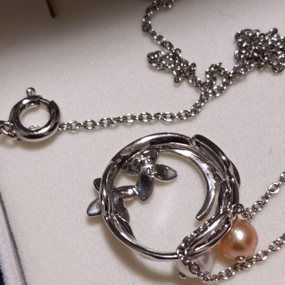 Takasaki pearl necklace pendant set featuring two items without accessories