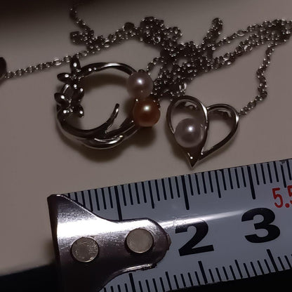 Takasaki pearl necklace pendant set featuring two items without accessories