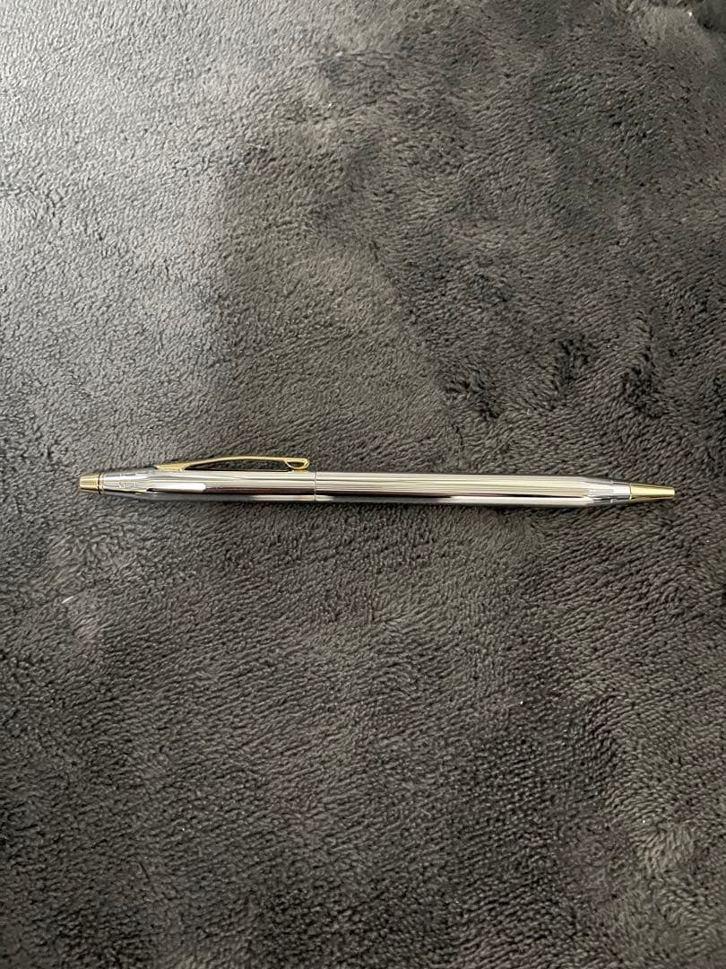 Silver CROSS metal ballpoint pen with clear body and sleek design