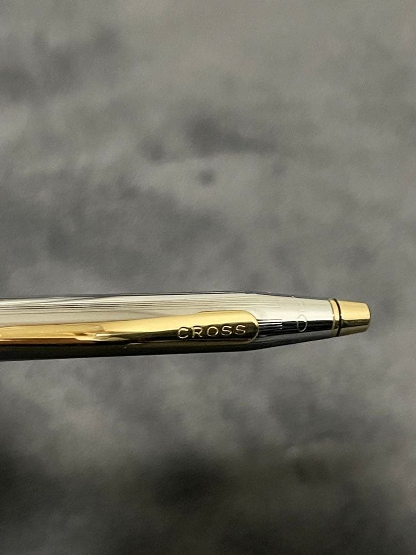 Silver CROSS metal ballpoint pen with clear body and sleek design