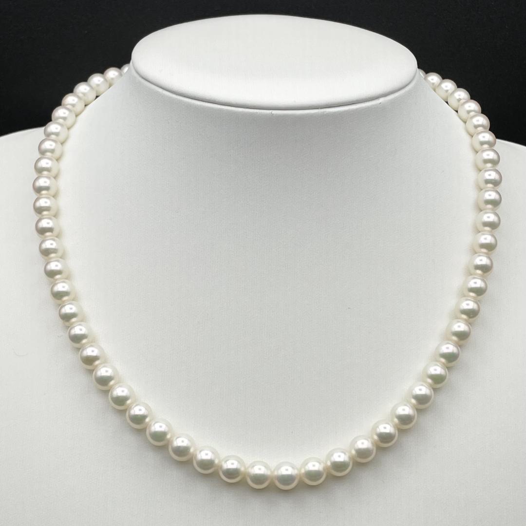 Akoya Hanadama pearl necklace with 7mm-6.5mm white pearls on a 43cm silver chain clasp