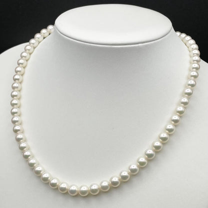Akoya Hanadama pearl necklace with 7mm-6.5mm white pearls on a 43cm silver chain clasp