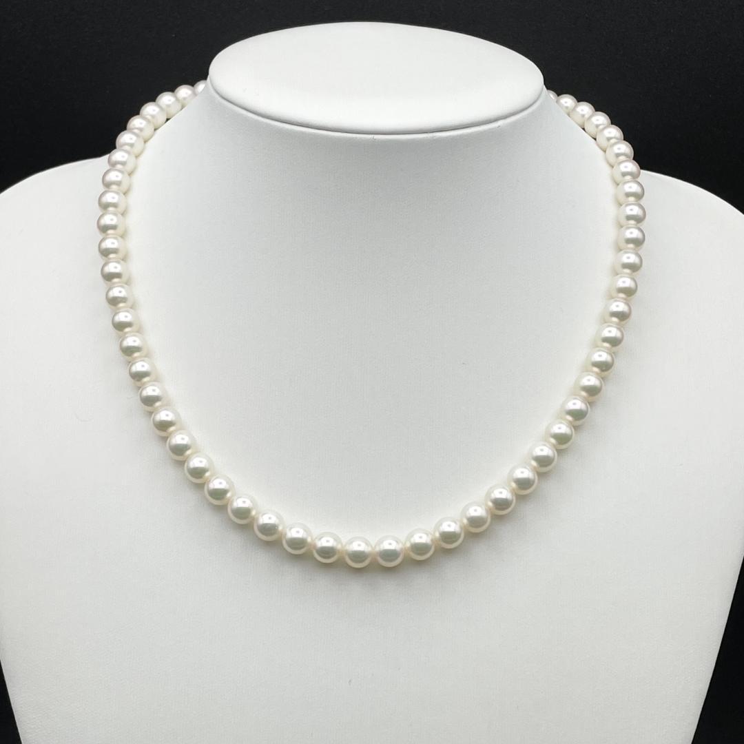 Akoya Hanadama pearl necklace with 7mm-6.5mm white pearls on a 43cm silver chain clasp