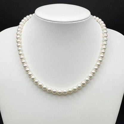 Akoya Hanadama pearl necklace with 7mm-6.5mm white pearls on a 43cm silver chain clasp