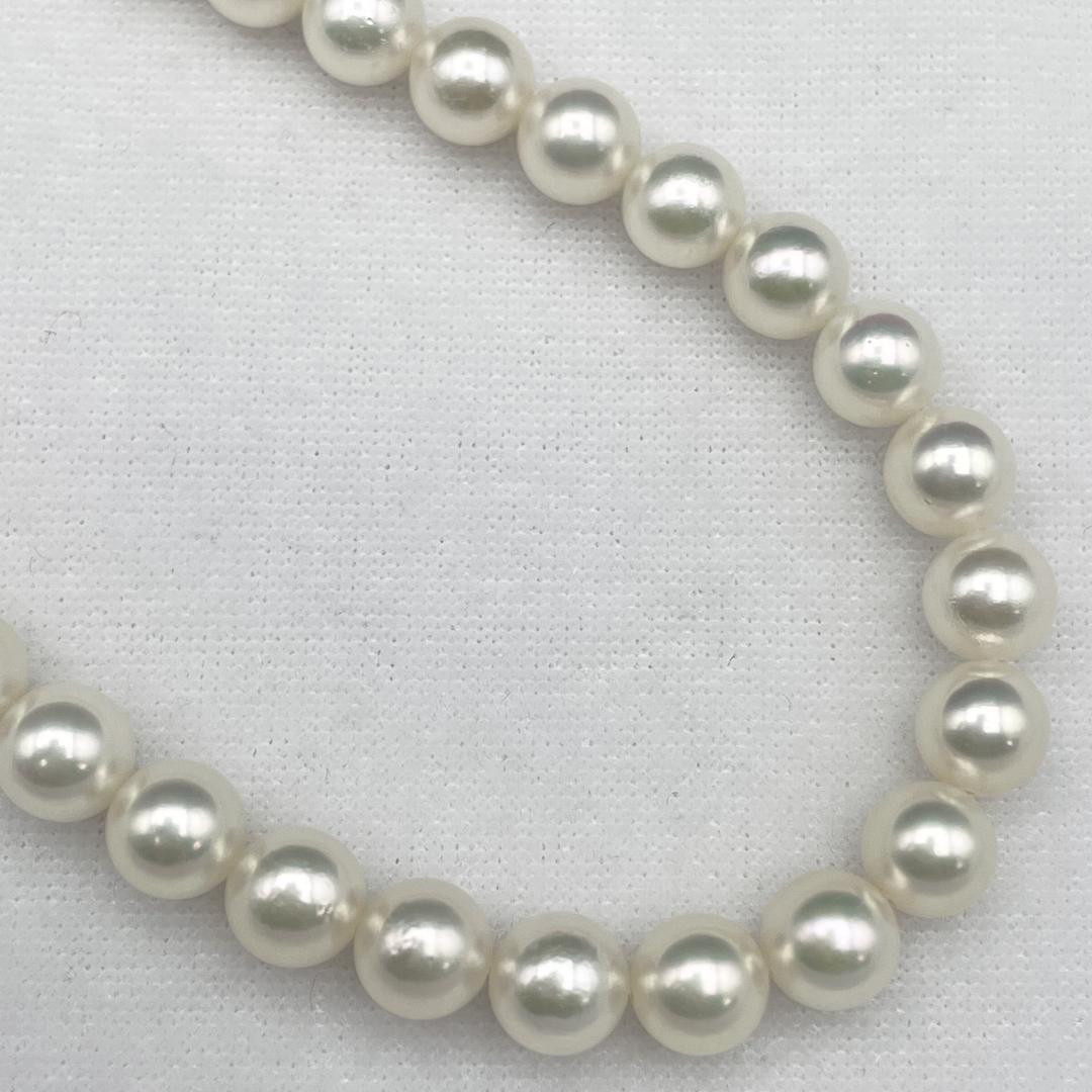 Akoya Hanadama pearl necklace with 7mm-6.5mm white pearls on a 43cm silver chain clasp