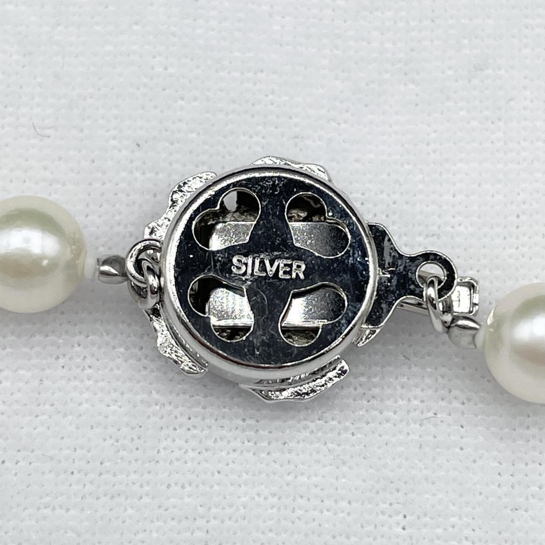 Akoya Hanadama pearl necklace with 7mm-6.5mm white pearls on a 43cm silver chain clasp
