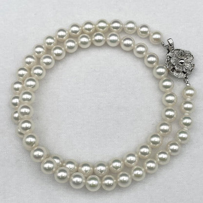 Akoya Hanadama pearl necklace with 7mm-6.5mm white pearls on a 43cm silver chain clasp