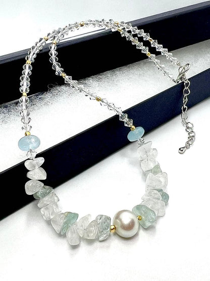Large 10mm round untone Akoya pearl necklace with aquamarine stones and crystal chain