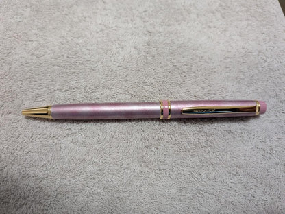 Pilot Grand Se Marble Pink ballpoint pen with gold accents and dedicated case on white background