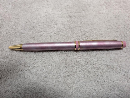 Pilot Grand Se Marble Pink ballpoint pen with gold accents and dedicated case on white background