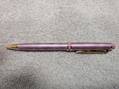 Pilot Grand Se Marble Pink ballpoint pen with gold accents and dedicated case on white background