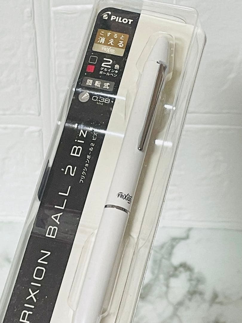 PILOT Frixion Ball 2 Biz 0.38mm pen in pearl white with black and red ink colors and rotary mechanism