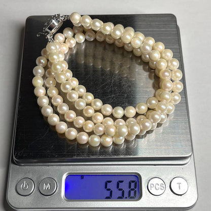 Two-strand Akoya pearl necklace with 6.5-7.0 mm pearls and silver marking, 41-44 cm length