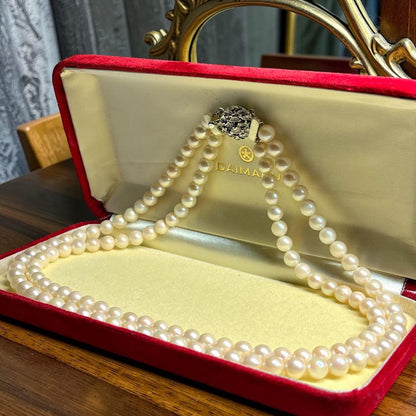 Two-strand Akoya pearl necklace with 6.5-7.0 mm pearls and silver marking, 41-44 cm length