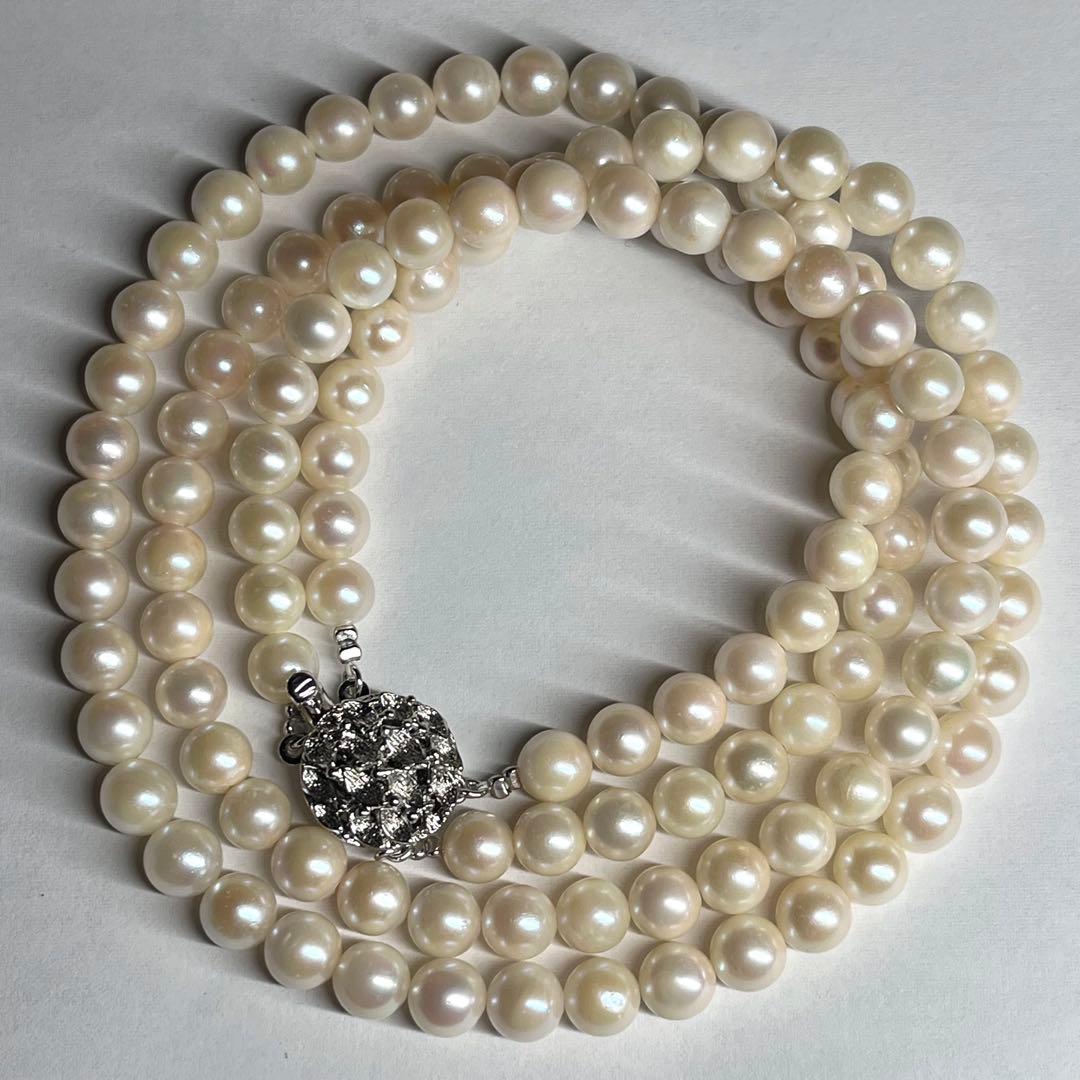 Two-strand Akoya pearl necklace with 6.5-7.0 mm pearls and silver marking, 41-44 cm length