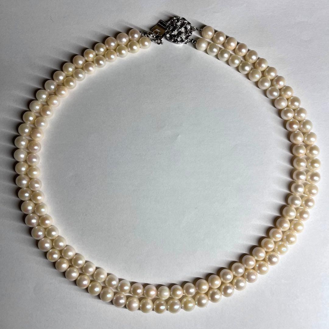 Two-strand Akoya pearl necklace with 6.5-7.0 mm pearls and silver marking, 41-44 cm length