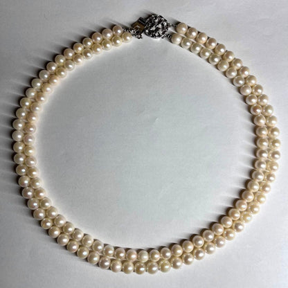 Two-strand Akoya pearl necklace with 6.5-7.0 mm pearls and silver marking, 41-44 cm length