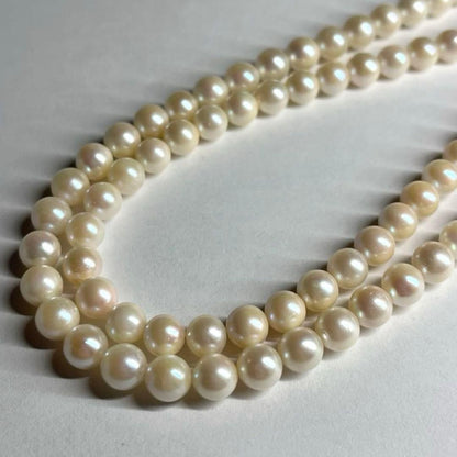 Two-strand Akoya pearl necklace with 6.5-7.0 mm pearls and silver marking, 41-44 cm length