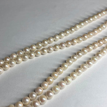 Two-strand Akoya pearl necklace with 6.5-7.0 mm pearls and silver marking, 41-44 cm length