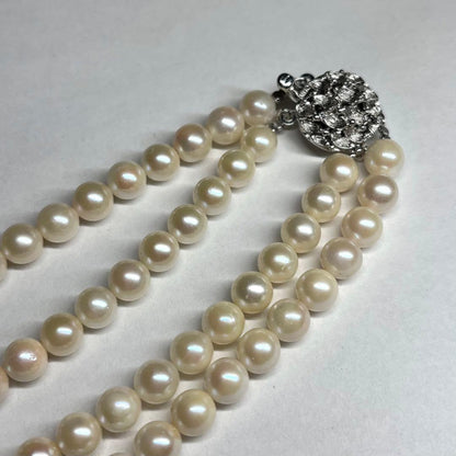Two-strand Akoya pearl necklace with 6.5-7.0 mm pearls and silver marking, 41-44 cm length