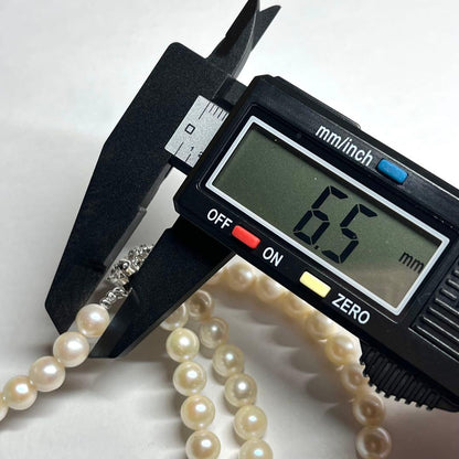 Two-strand Akoya pearl necklace with 6.5-7.0 mm pearls and silver marking, 41-44 cm length