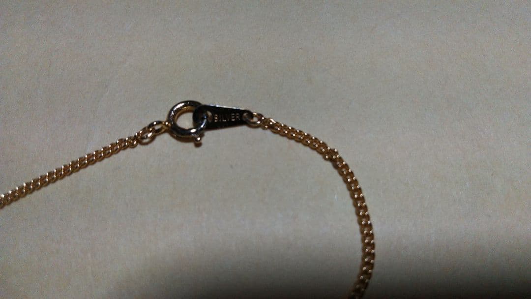 Mikimoto pearl necklace with gold and silver chain and 25mm by 15mm pearl pendant