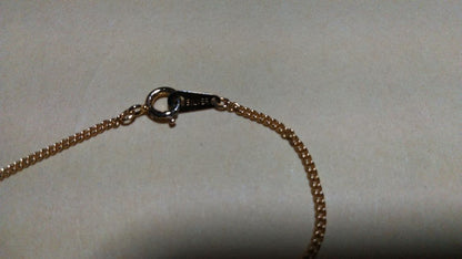 Mikimoto pearl necklace with gold and silver chain and 25mm by 15mm pearl pendant