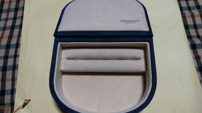 Mikimoto pearl necklace with gold and silver chain and 25mm by 15mm pearl pendant