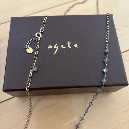 agete long necklace measuring 99 cm in length displayed on a white background