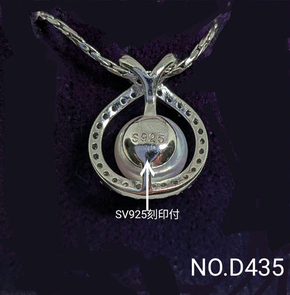 Silver Akoya pearl pendant with cubic zirconia on 42cm stainless steel chain shown on white background