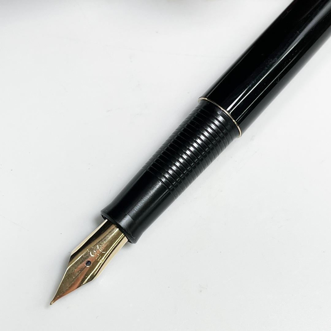Pilot pen writing instrument set including fountain pen, ballpoint pen, and mechanical pencil with slight scratches