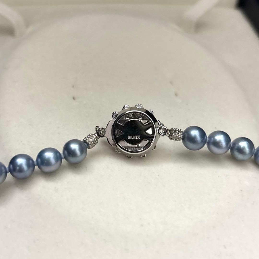 Aqua Akoya pearl necklace with round blue-grey pearls 6.5-7mm, 42cm length, silver stamp