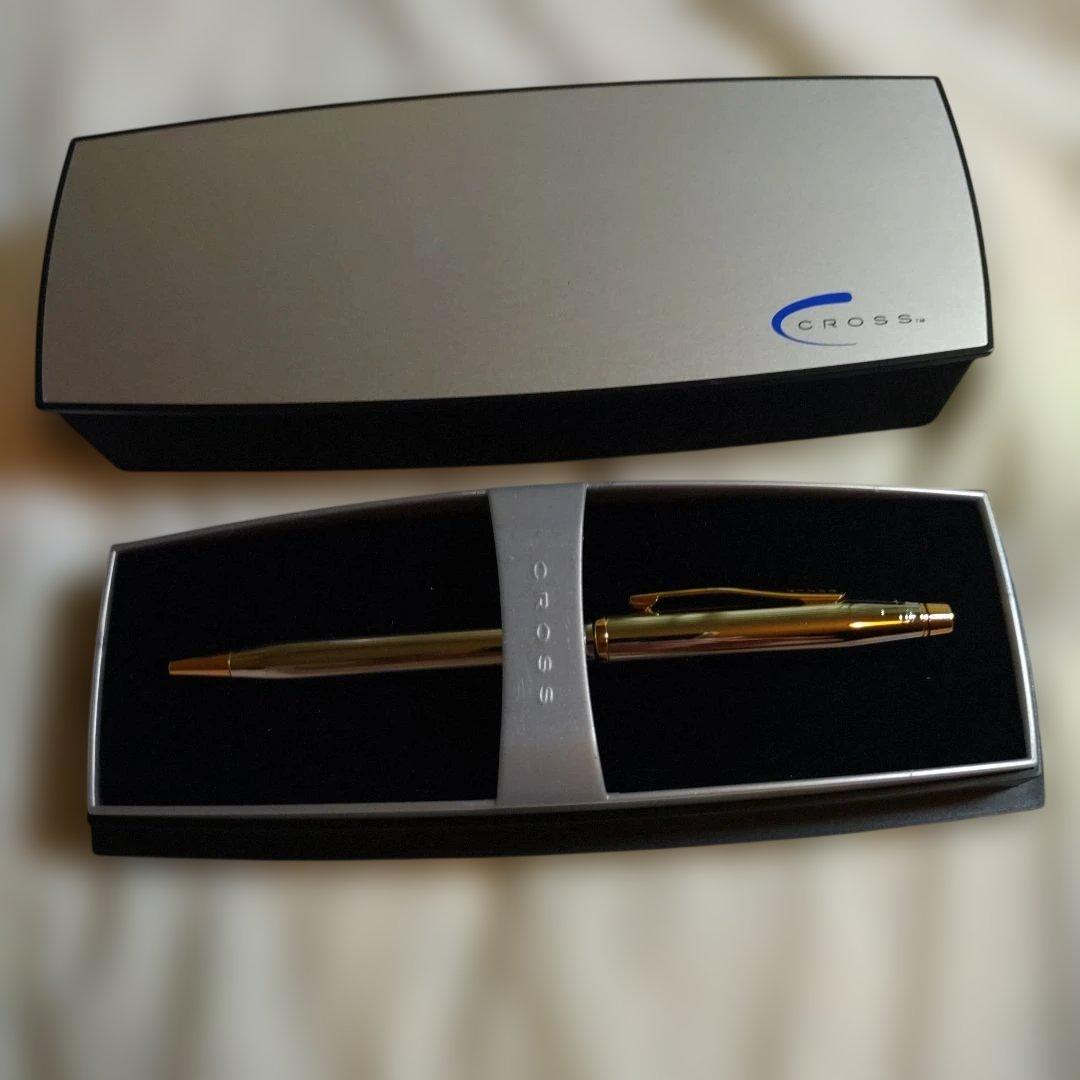 Kuro gold plated Cross ballpoint pen with sleek design showing elegant owner's style