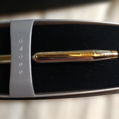 Kuro gold plated Cross ballpoint pen with sleek design showing elegant owner's style
