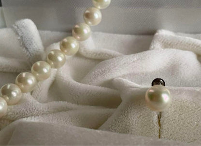 Akoya pearl necklace with 6.5-7mm pearls and matching 7mm pearl earrings set in K14 white gold